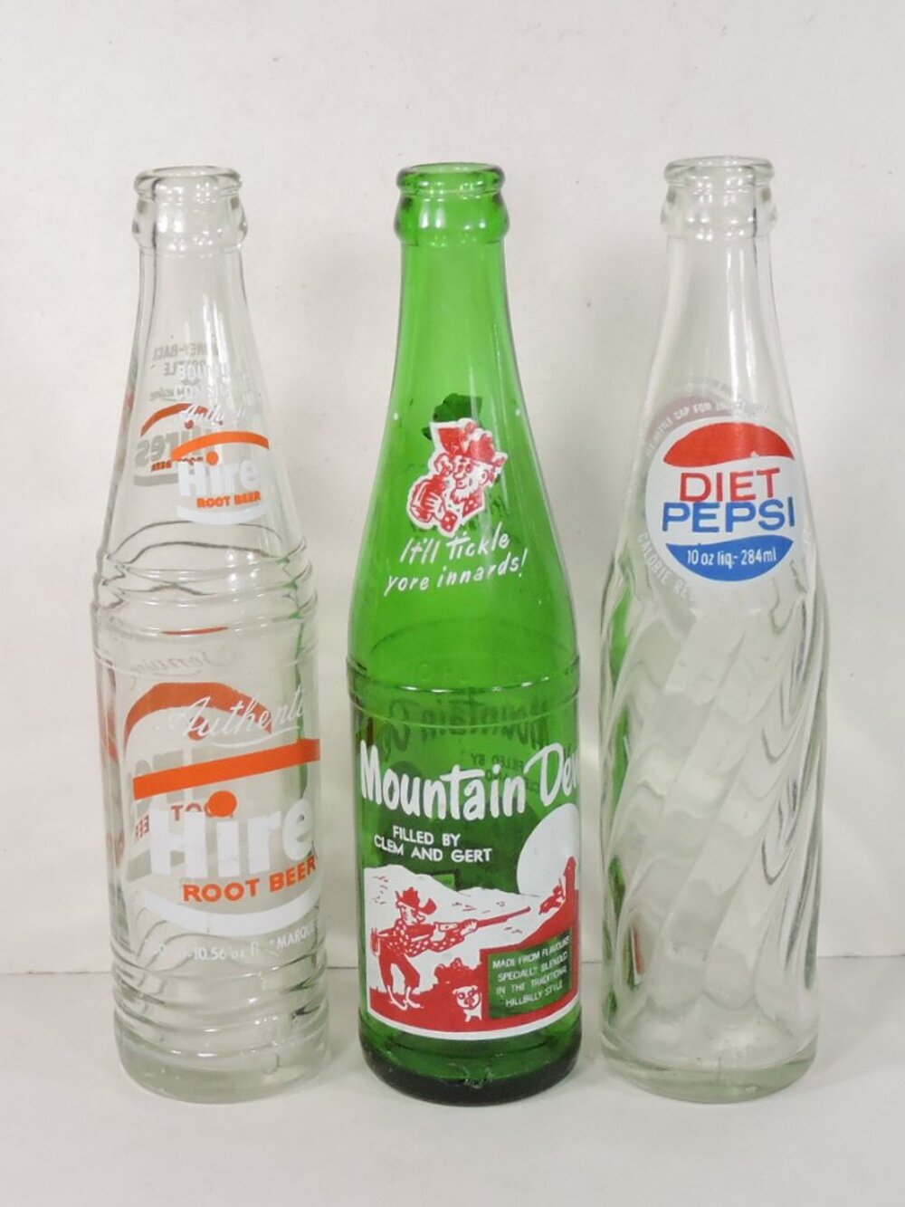 3 Vintage 10 oz Soda Pop Bottles - Hires Root Beer - Mountain Dew - Diet Pepsi